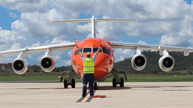 Cargo is loaded onto an aircraft at Wellcamp airport.