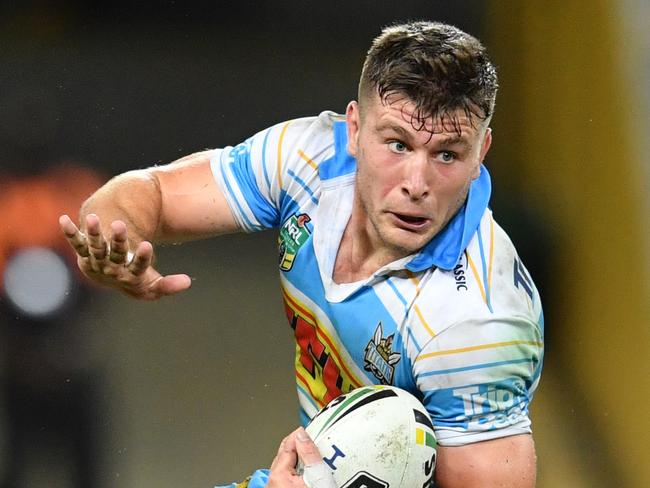 Jai Arrow (right) of the Titans gets past Darius Boyd (left) of the Broncos during the Round 4 NRL match between the Brisbane Broncos and the Gold Coast Titans at Suncorp Stadium in Brisbane, Sunday, April 1, 2018. (AAP Image/Darren England) NO ARCHIVING, EDITORIAL USE ONLY