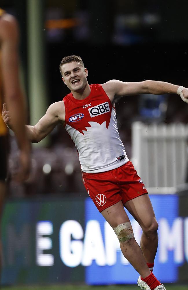 Tom Papley celebrates a goal for the Swans.