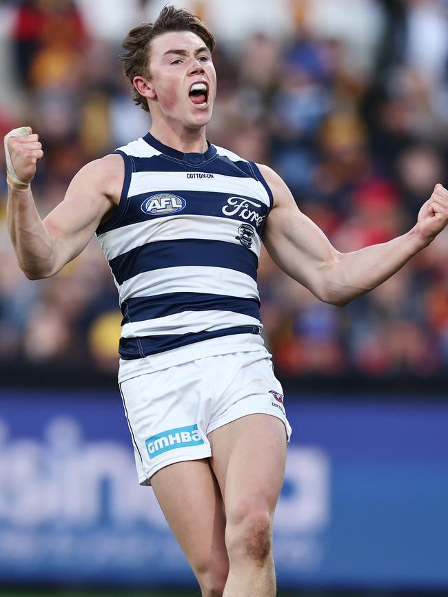 Tanner Bruhn celebrates a goal which helped kill off the Crows.