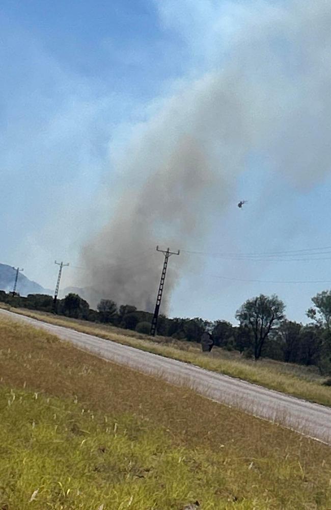 Smoke and fire was reported at the Ross Hwy near Amoonguna, south of Alice Springs. Picture: Action for Alice 2020