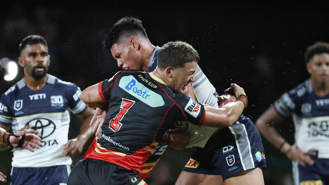 Dolphins' Kurt Donoghoe hits Cowboys' Jaxon Paulo hard in the National Rugby League (NRL) pre season NRL match between the North Queensland Cowboys and the Dolphins, held at Barlow Park. Picture: Brendan Radke