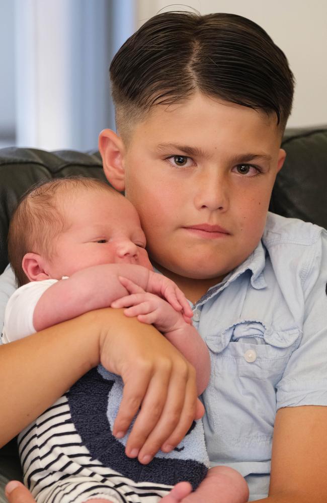 Braxton, 11, with his newborn brother, Tarkyn. Picture: Mark Wilson