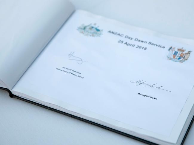 A note signed by Prince Harry and Meghan Markle. Picture: AFP/Pool/Tolga Akmen