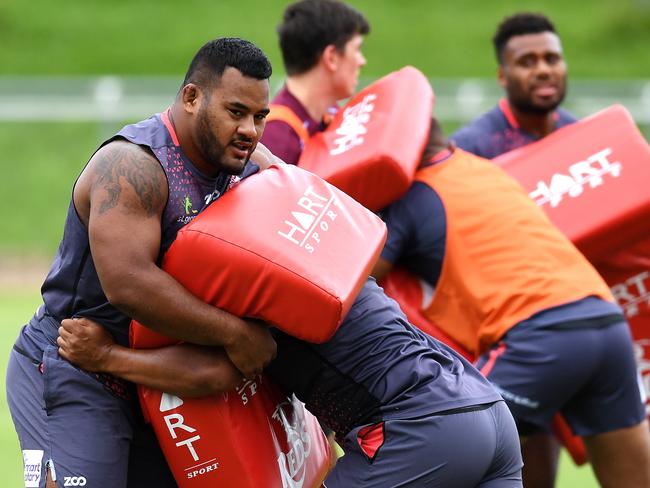 Queensland Reds player Taniela Tupou (left) is seen during training in Brisbane, Thursday, March 8, 2018. The Reds will clash with the Bulls in round 4 this Saturday at Suncorp Stadium. (AAP Image/Dan Peled) NO ARCHIVING