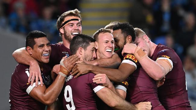 Queensland players celebrate during their win in game three. Picture: Getty Images