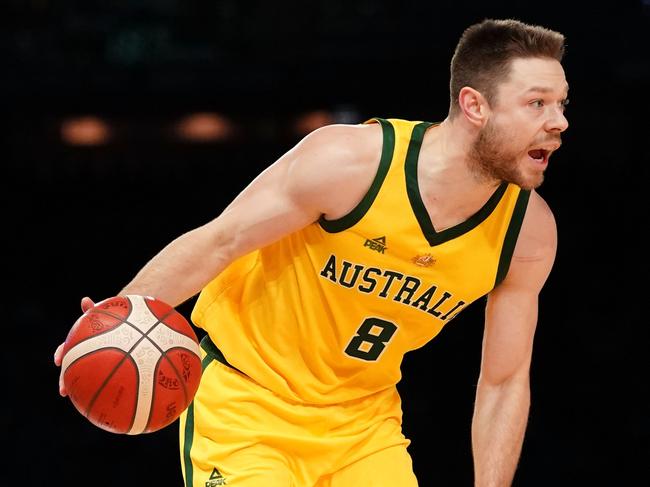 Matthew Dellavedova of Australia controls the ball during match 2 of the Pre-FIBA World Cup series between Australia and the USA  at Marvel Stadium in Melbourne, Saturday, August 24, 2019.  (AAP Image/Scott Barbour) NO ARCHIVING, EDITORIAL USE ONLY