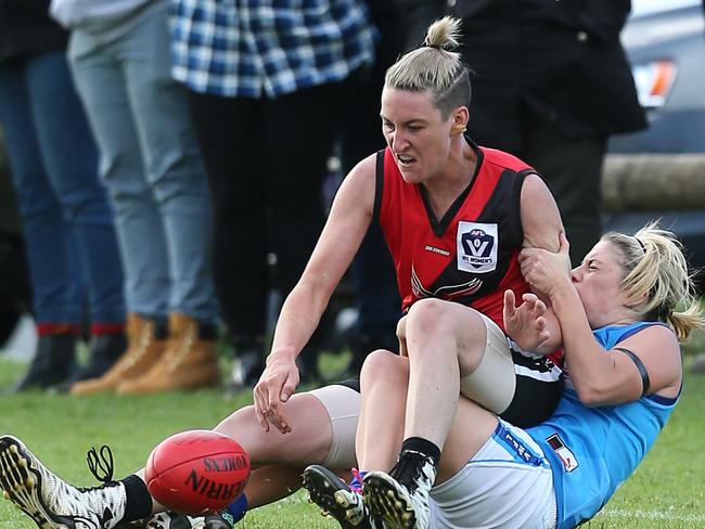 VFL (state league) women's footy: Knox v VU Western Spurs, at Schultz Reserve, Wantirna, #4, Knox, (red) & Kylie Nicolaci, 17, VU Western Spurs, Picture Yuri Kouzmin