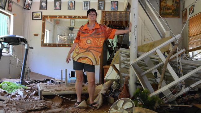 Wendy Ashworth and her husband Gary face an overwhelming task cleaning their home, left broken and chaotic and under a thick layer of mud following the flood. Picture: Bronwyn Farr