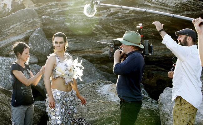 A documentray film crew films Artist Marina De Bris dressing model and marine biologist Laura Wells. Picture: John Appleyard