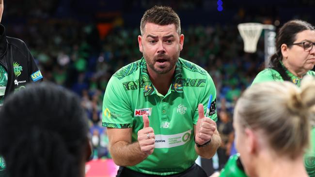 PERTH, AUSTRALIA - JUNE 03: Dan Ryan head coach of the fever talks to the players during the 3rd quarter break during the round 12 Super Netball match between West Coast Fever and Sunshine Coast Lightning at RAC Arena, on June 03, 2023, in Perth, Australia. (Photo by James Worsfold/Getty Images)