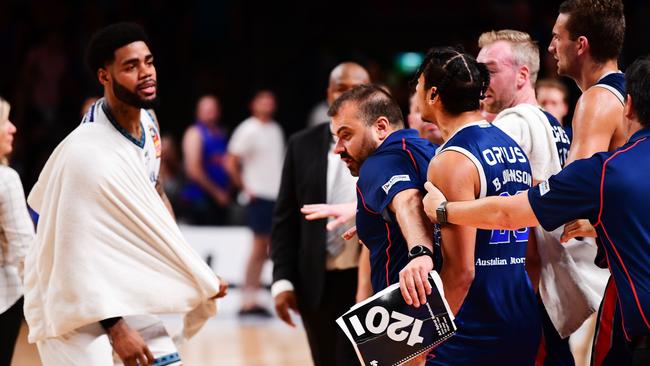 Adelaide youngster Bijan Johnson (right) fined for sideline spat with Melbourne United players. Picture: Getty