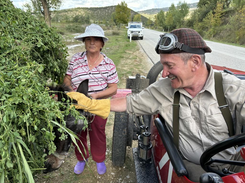 Warren Brown meets the locals in Albania. Picture: Supplied