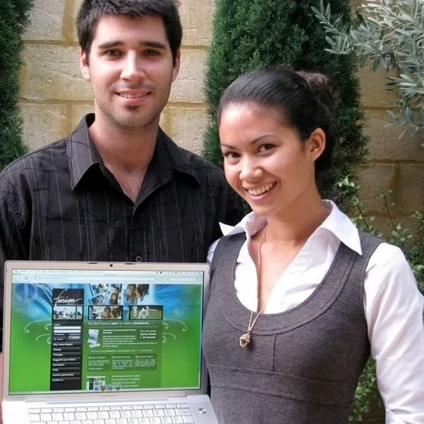 Obrecht and Perkins, pictured in 2011, with their first website for Fusion Books.