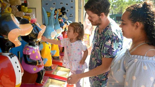 Brailynn Donald, Keedon Donald-Passmore and Thea Hayes at the Mt Morgan Show arcade. Picture: Jann Houley