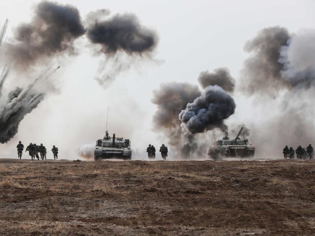 PLA infantrymen with tanks during a training exercise. Picture: chinamil.com.cn