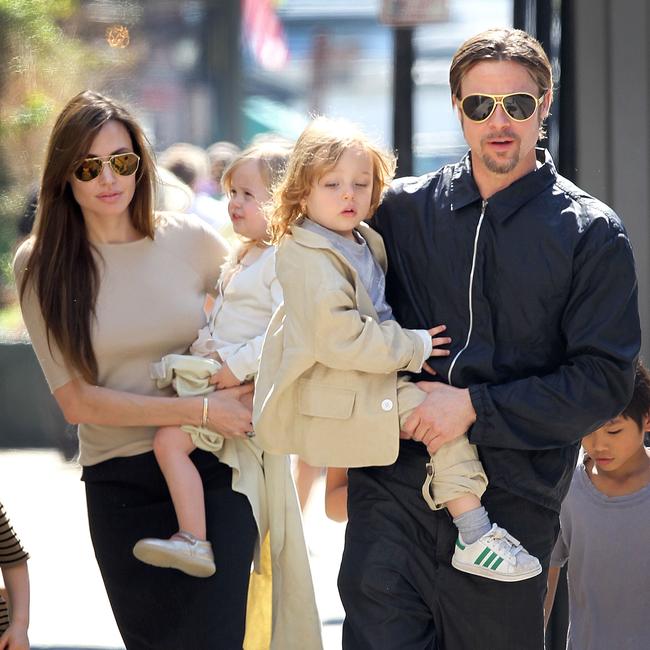 Brad Pitt seen carrying Knox as Angelina carried Vivienne on March 20, 2011 in New Orleans. Picture: Splash