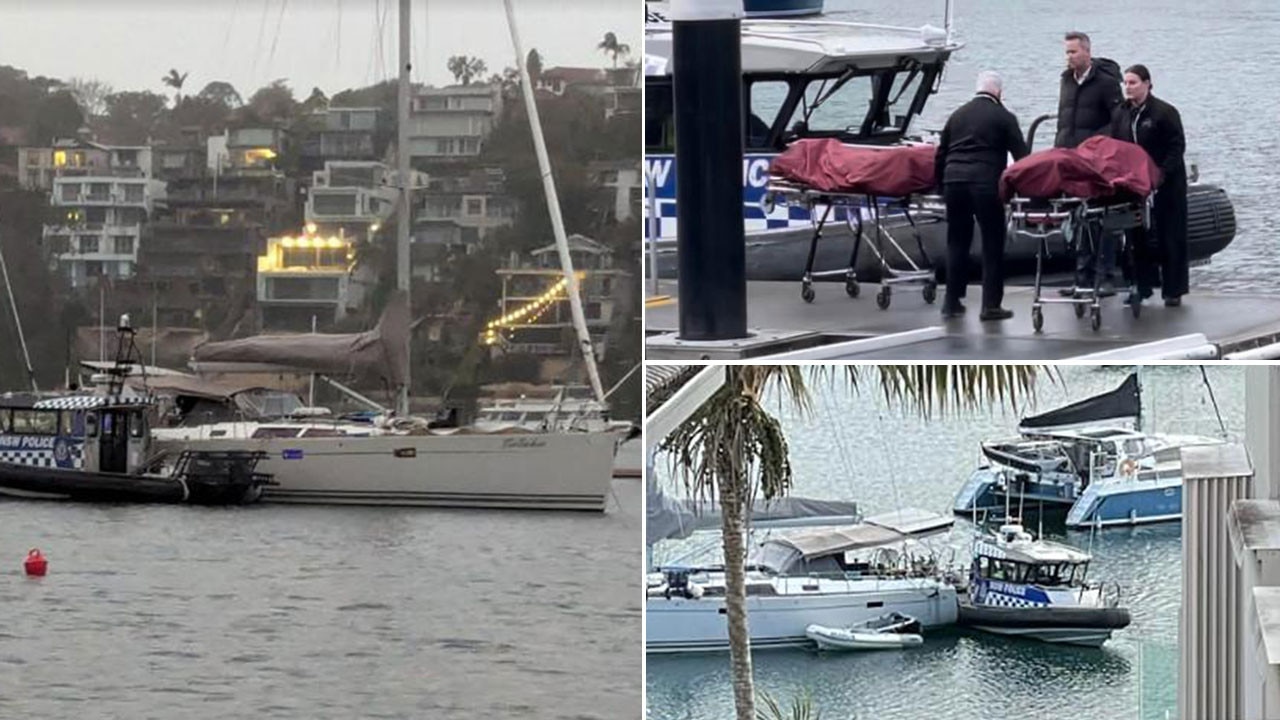 Grim image of bodies removed after man, woman found dead on yacht