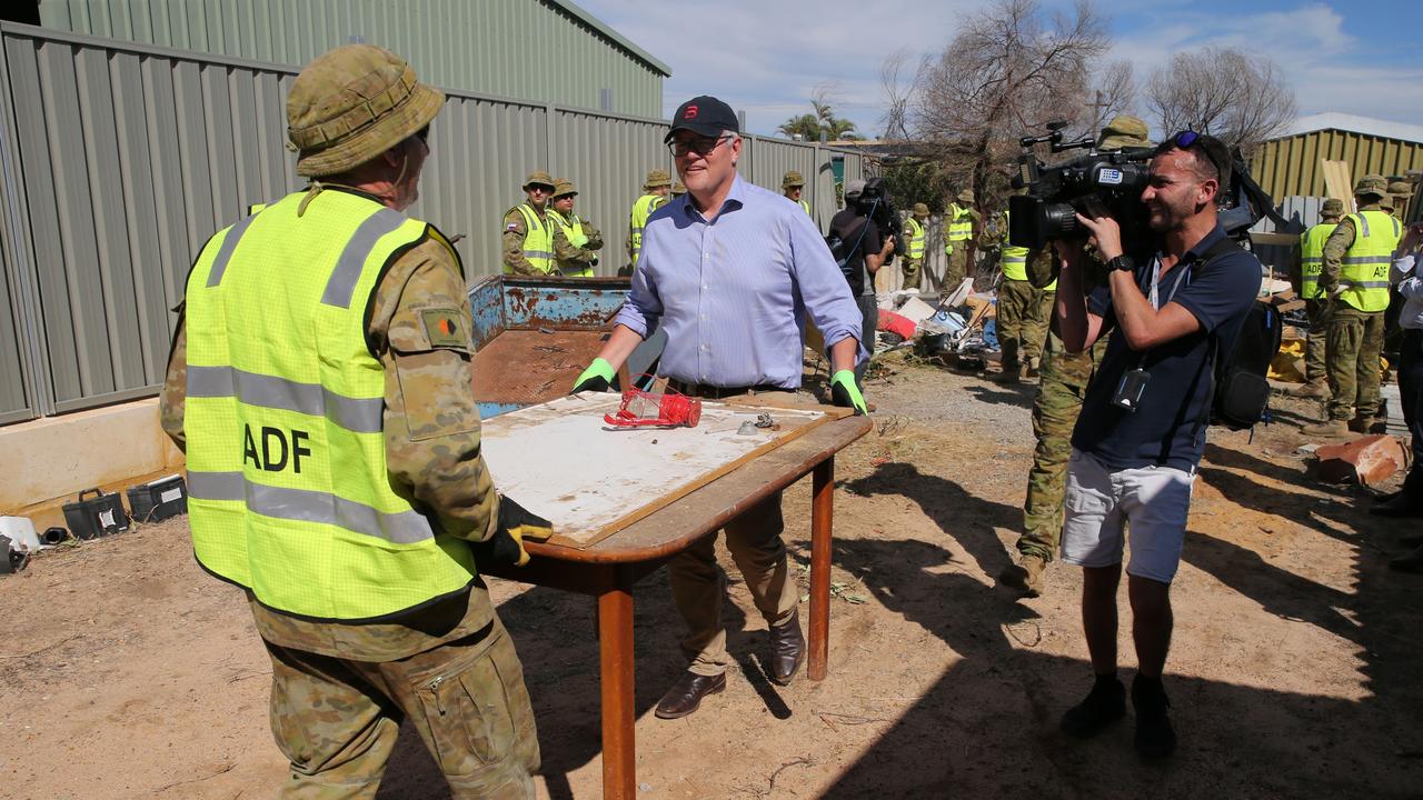 Scott Morrison lends a hand with the recovery. Picture: Justin Benson-Cooper/The West Australian