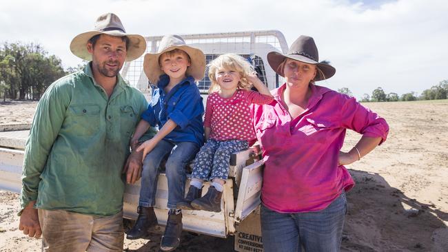 Rob and Jess Taylor with two of their four children, Bonnie (girl), 2, and Charlie, 5. Picture: Dylan Robinson