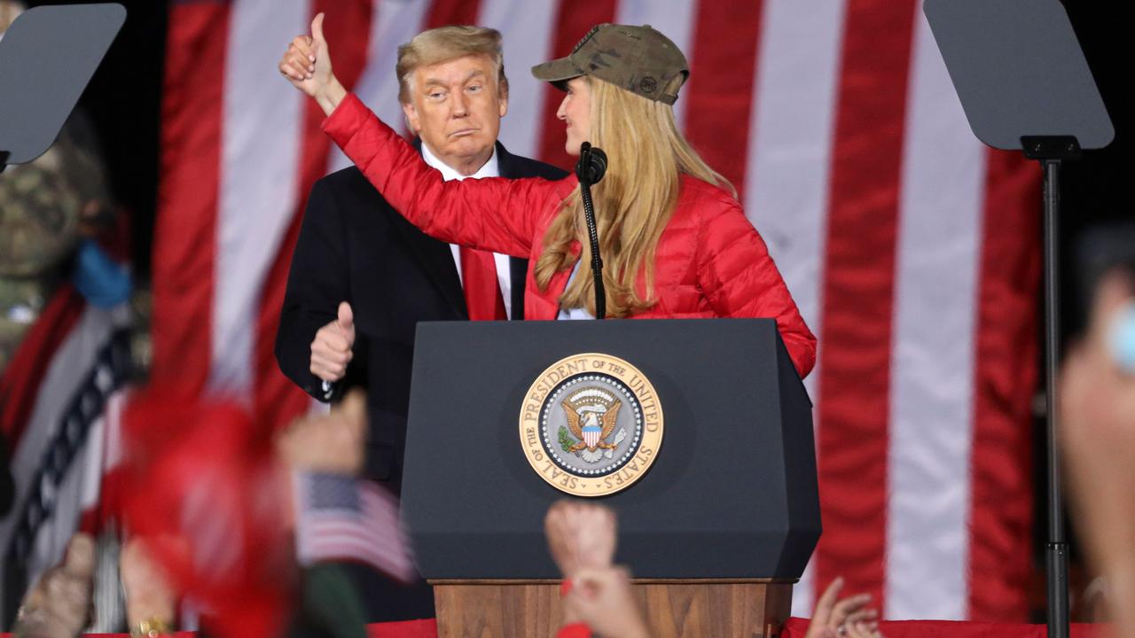 Mr Trump at a rally in Georgia with Ms Loeffler the night before the runoff elections. Picture: Sandy Huffaker/AFP