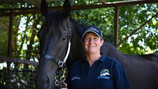 Trainer Donna Scott saddles up Daze Off at Wagga on Monday.