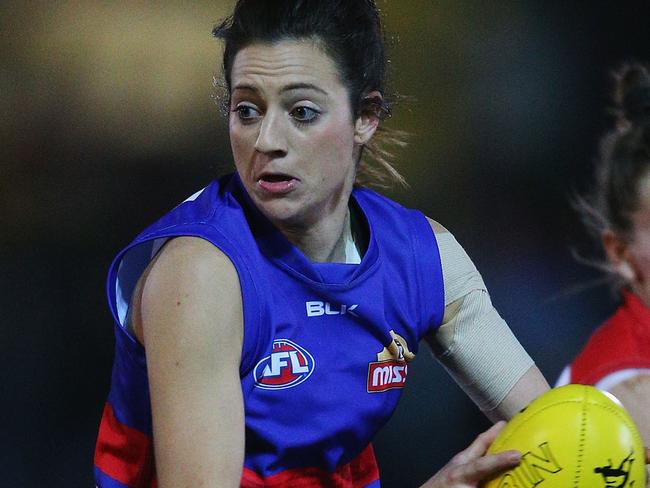 MELBOURNE, AUSTRALIA - SEPTEMBER 03: Stephanie Chiocci of the Bulldogs runs with the ball during the AFL Women's Exhibition Match between the Western Bulldogs and the Melbourne Demons at Whitten Oval on September 3, 2016 in Melbourne, Australia. (Photo by Michael Dodge/Getty Images)