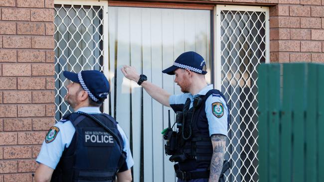 Police searching a property in Kempsey. Picture: Max Mason-Hubers