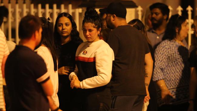 Family and friends arrive at the scene after Nabil was shot dead. Picture: Wayne Taylor