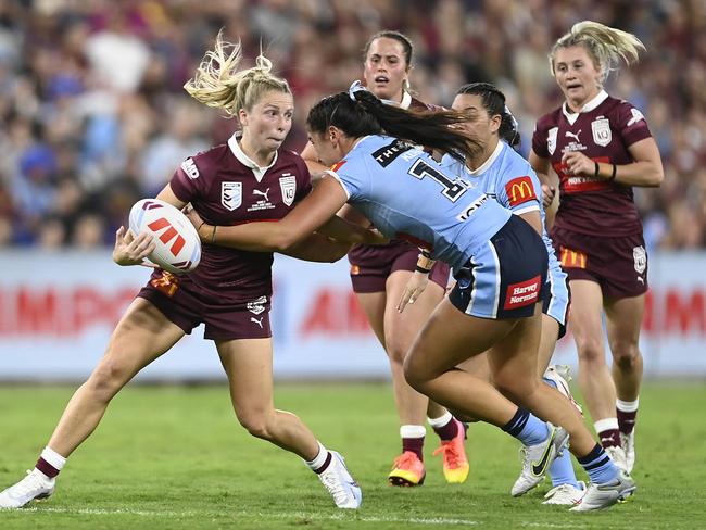 Tarryn Aiken of the Maroons is tackled during game two of the women's State of Origin series between NSW Skyblues and Queensland Maroons at Queensland Country Bank Stadium on June 22, 2023 in Townsville, Australia. (Photo by Ian Hitchcock/Getty Images)