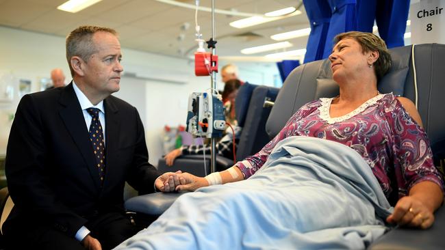 Opposition Leader Bill Shorten speaks to cancer patient Judy Dixon at a Brisbane hospital. Picture: Lukas Coch