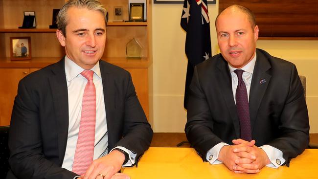 Josh Frydenberg with Commonwealth Bank CEO Matt Comyn, at the Commonwealth Parliamentary Offices in Melbourne. Picture: Stuart McEvoy.