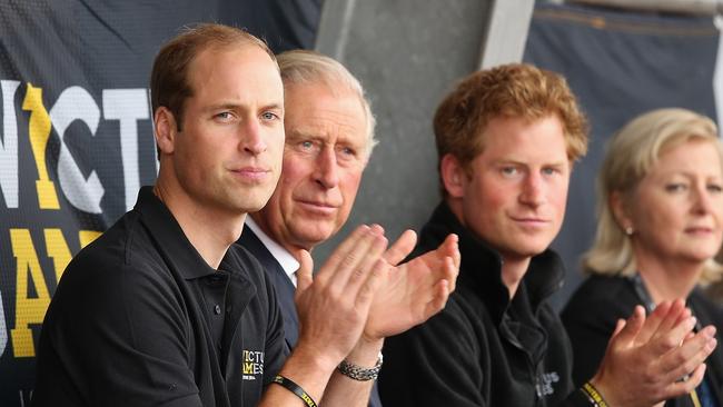 Prince William and Prince Harry with the then Prince Charles during the Invictus Games in 2014 in London. Picture: Getty Images