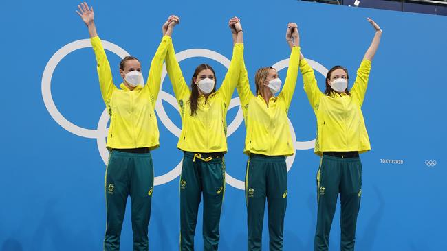 Bronte Campbell, Meg Harris, Emma McKeon and Cate Campbell celebrate winning gold at Tokyo