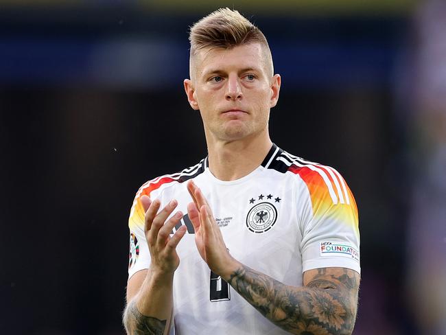 STUTTGART, GERMANY - JULY 05: Toni Kroos of Germany applauds the fans after the UEFA EURO 2024 quarter-final match between Spain and Germany at Stuttgart Arena on July 05, 2024 in Stuttgart, Germany. (Photo by Alex Livesey/Getty Images)