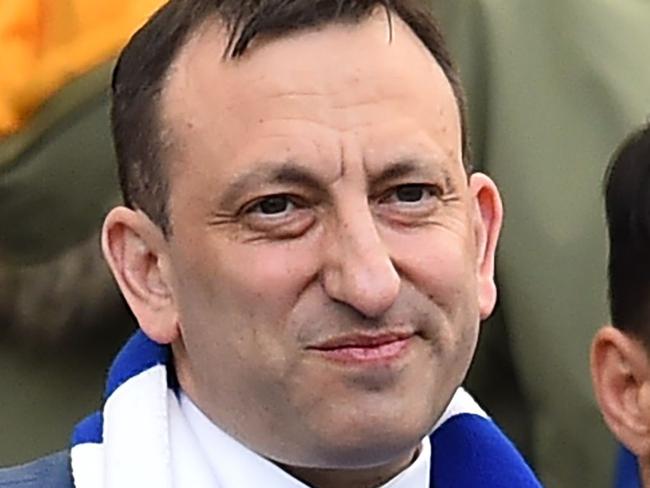 (FILES) In this file photo taken on April 27, 2019 Brighton's chairman Tony Bloom (L) takes his seat for the English Premier League football match between Brighton and Hove Albion and Newcastle United at the American Express Community Stadium in Brighton, southern England. - Brighton chairman Tony Bloom fears English football will pay a heavy price as a result of the coronavirus-enforced shutdown unless the sport's key stakeholders unite. (Photo by Glyn KIRK / AFP) / RESTRICTED TO EDITORIAL USE. No use with unauthorized audio, video, data, fixture lists, club/league logos or 'live' services. Online in-match use limited to 120 images. An additional 40 images may be used in extra time. No video emulation. Social media in-match use limited to 120 images. An additional 40 images may be used in extra time. No use in betting publications, games or single club/league/player publications. /