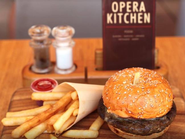 Dine on your favourite burger underneath the sails of Sydney Opera House at the Opera Kitchen. Picture: Facebook