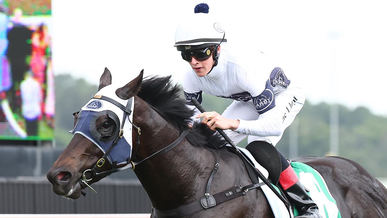 KEMBLA GRANGE, AUSTRALIA - NOVEMBER 25: Zac Lloyd riding Insurrection wins Race 8 The Warra during Sydney Racing at Kembla Grange Racecourse on November 25, 2023 in Kembla Grange, Australia. (Photo by Jeremy Ng/Getty Images)