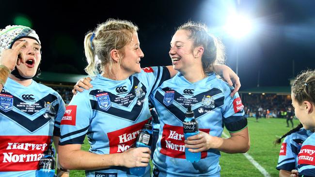 Talesha Quinn and Kezzie Apps celebrate winning the women's State of Origin at North Sydney Oval. Pics Adam Head