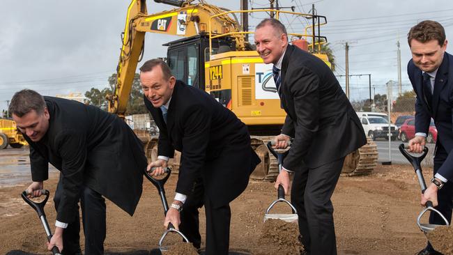 South Australian MP Jamie Briggs, former Australian Prime Minister Tony Abbott, former SA Premier Jay Weatherill and MP Stephen Mullighan sod turn, Wednesday, Aug 5, 2105. Picture: AAP Image / Ben Macmahon