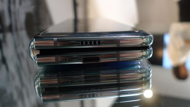 The Samsung Galaxy Fold has a small screen on the outside, and reveals a larger screen inside. Picture: AP Photo/Kelvin Chan