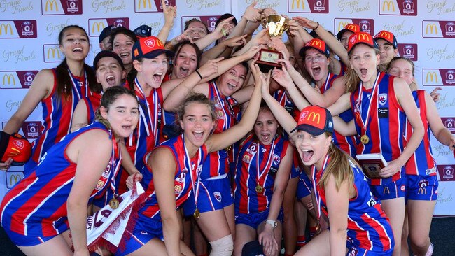 Wilston Grange celebrate a 2020 grand final win.