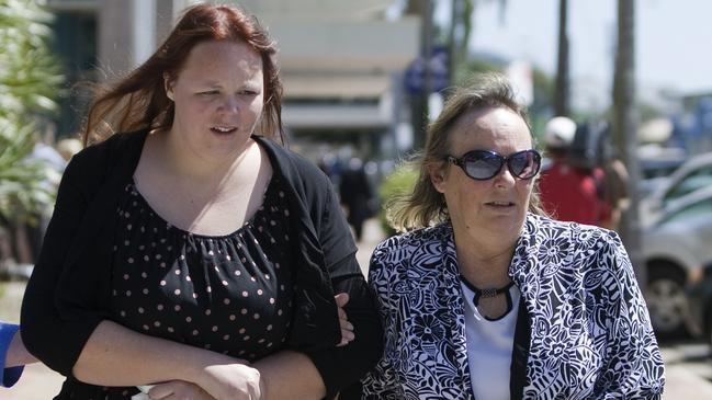 Sister and mum of Leanne Mayhew, Michelle Mayhew and Sue Mayhew, outside the Cairns Supreme Court in 2012.