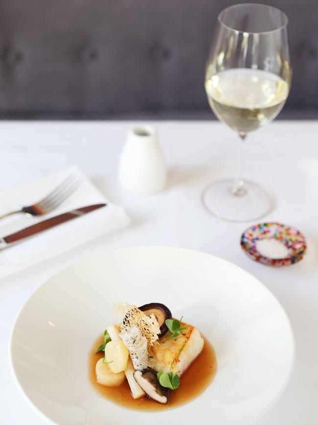 Black kingfish in brown butter with veal broth. Picture: Rebecca Michael