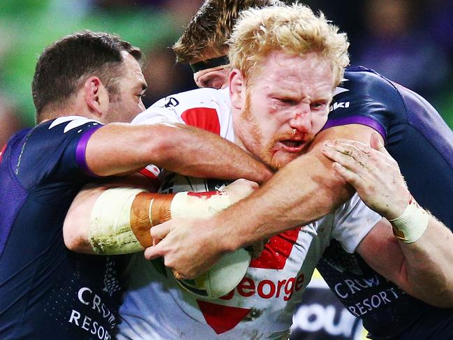 MELBOURNE, AUSTRALIA - JULY 05:  James Graham of the Dragons is tackled  during the round 17 NRL match between the Melbourne Storm and the St George Illawarra Dragons at AAMI Park on July 5, 2018 in Melbourne, Australia.  (Photo by Michael Dodge/Getty Images)