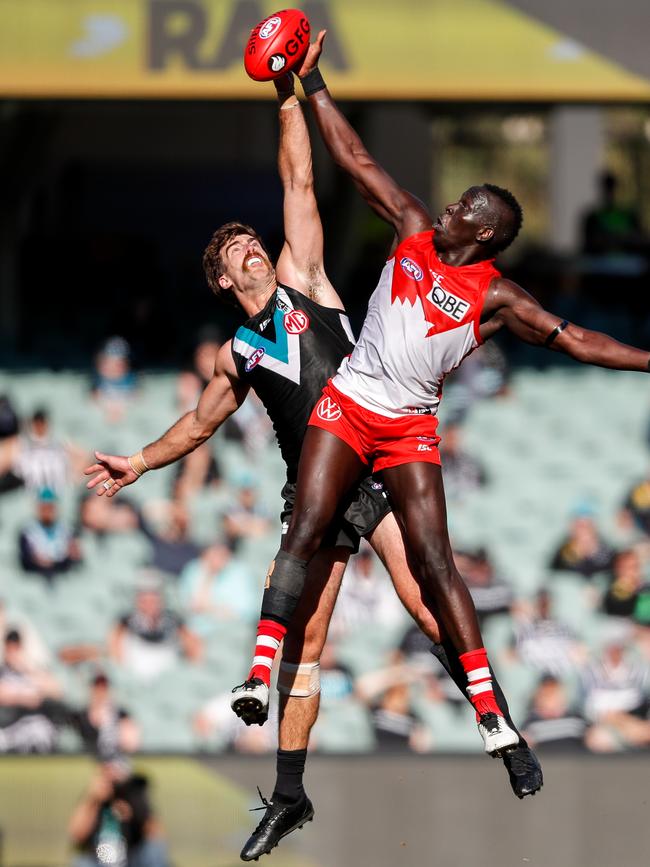 Aliir up against Scott Lycett while playing in the ruck for Sydney in 2020. Picture: Getty Images