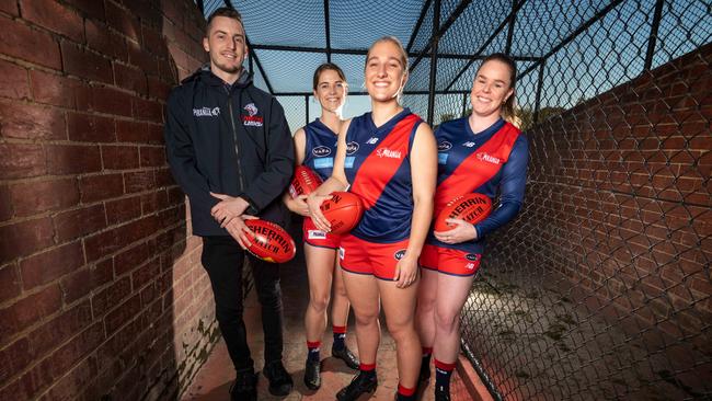 Coburg put up a good performance against the reigning premiers on Saturday. Pictured is coach Thomas Chitsos with Claire Cashman (Leadership Group), Amy Duguid (Captain) and Morgan McNally (Leadership Group) at the Coburg Football Ground. Picture: Tony Gough