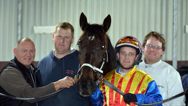 Trainer Ben Yole (second from left) with his father Wayne (far left) and brothers Mark and Tim TAS RACING