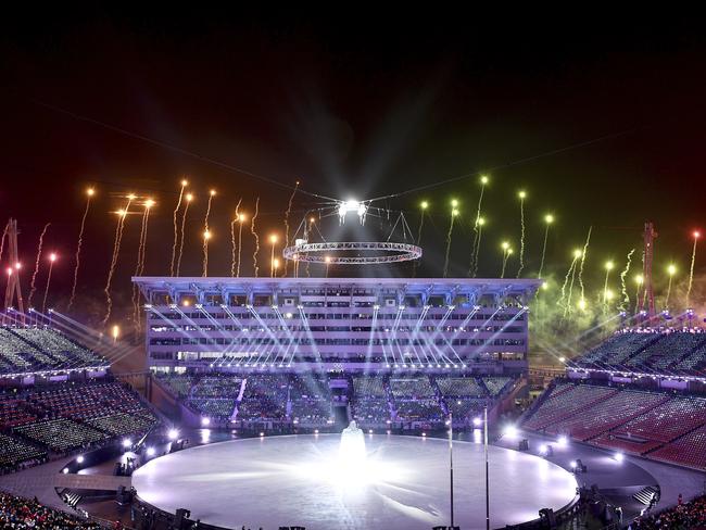 Colourful fireworks surround the stadium. Picture:(Franck Fife/Pool Photo via AP