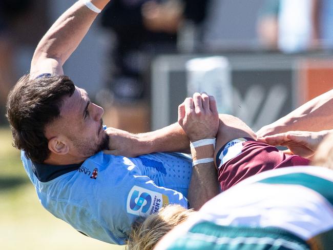 15/10/23. News Local, SportSylvania, Sydney, NSW, Australia.Super Rugby U19sAction from the NSW Waratahs v Queensland Reds Under 19 game at Forshaw Park in SylvaniaNSW player Omar Noureddine is bundles into touchPicture: Julian Andrews